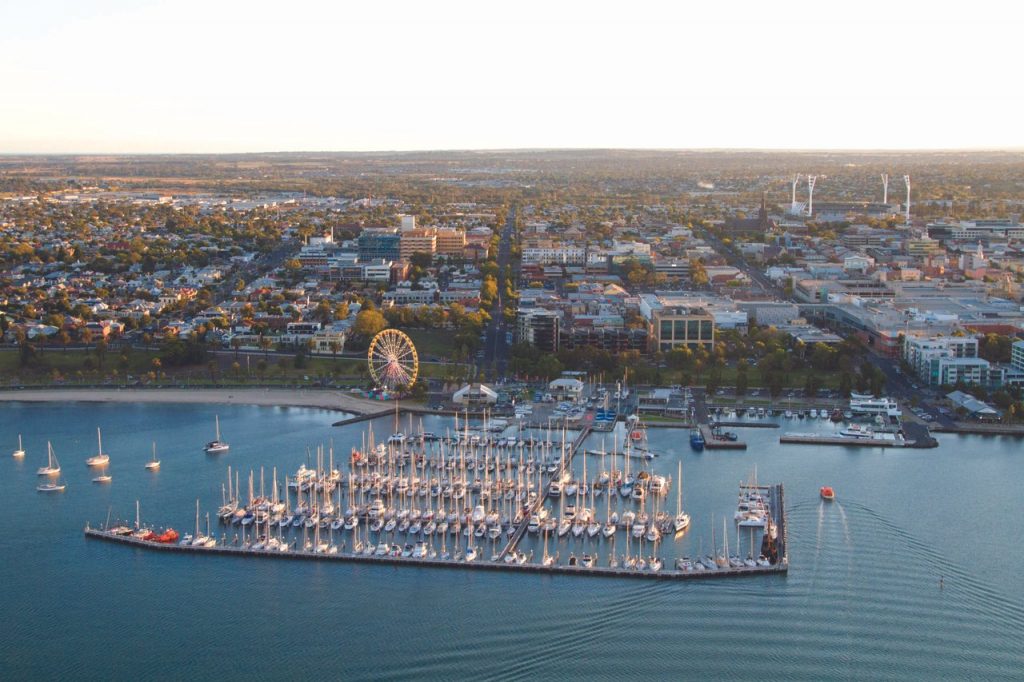 Bird's-eye view of the Geelong waterfront, with the ferris wheel and yacht club in foreground,